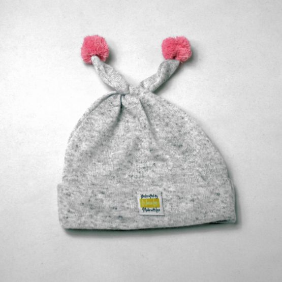 Grey beanie with light pink pom poms